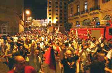 Protesters against shutting down Lebanese Murr TV (MTV) in 2001. 